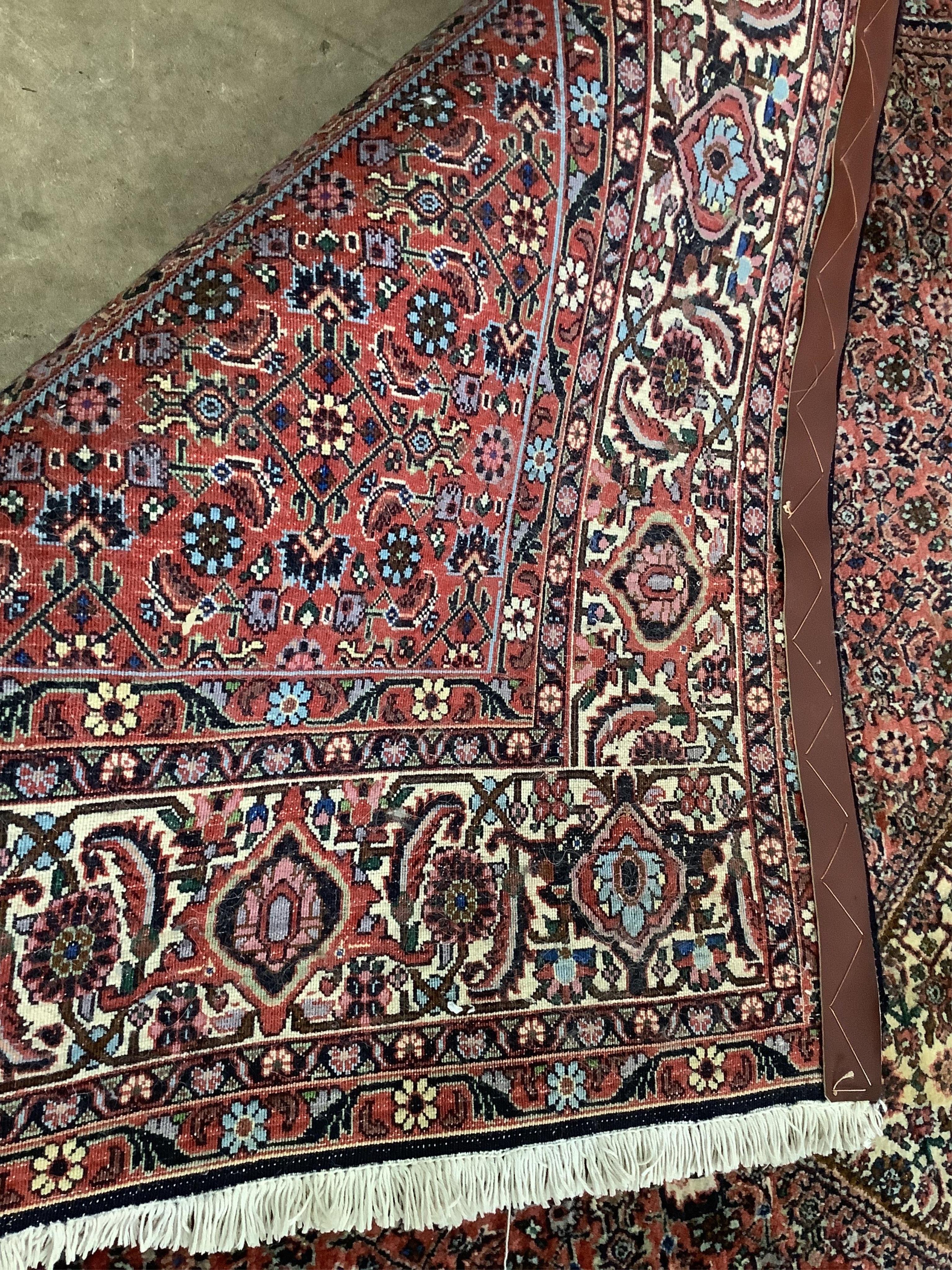 A North West Persian blue ground carpet, 300 x 200cm